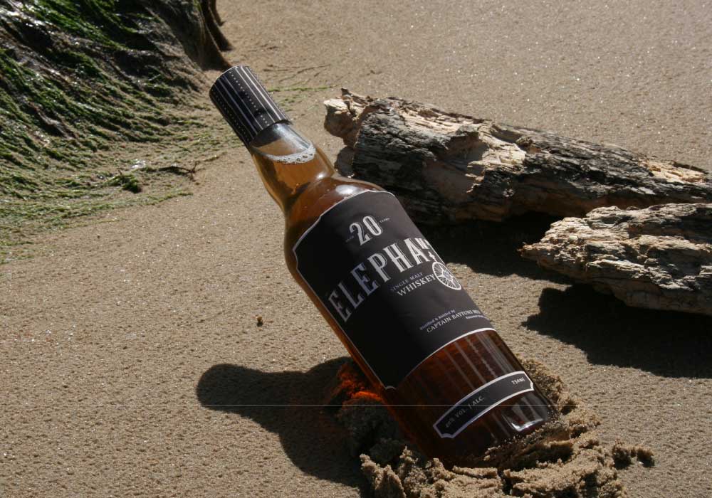 Bottle label and packaging design for a whiskey brand with a new logo and identity. Created by Creative Footing.